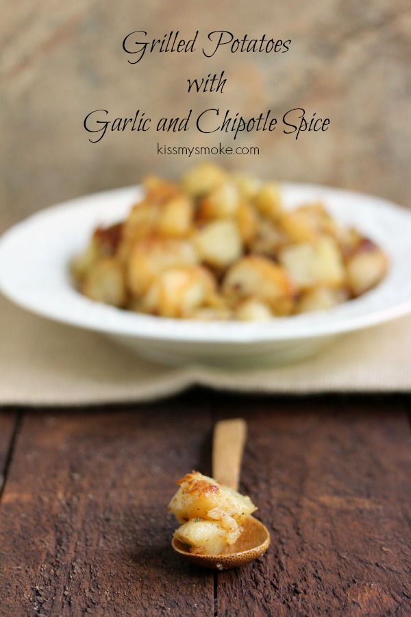 Grilled Potatoes with Garlic and Chipotle Spice | kissmysmoke.com | Grilled Potatoes roasted in a pan with butter, fresh garlic, red pepper dressing, and just a hint of chipotle spice to add a little heat.