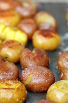 Grilled Smashed Potatoes | kissmysmoke.com | Ruby and Golden Mini Potatoes cooked in chicken broth, then smashed and cooked on the grill with butter, and coarse salt. Absolutely delicious!