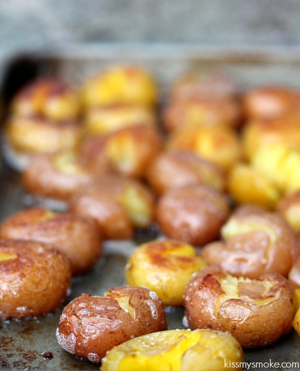 Grilled Smashed Potatoes cooked to perfection on your grill. 