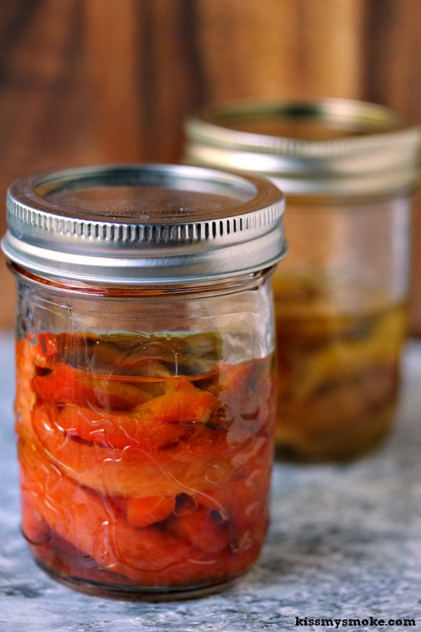 Fire Roasted Peppers in mason jars ready to be stored in the fridge.