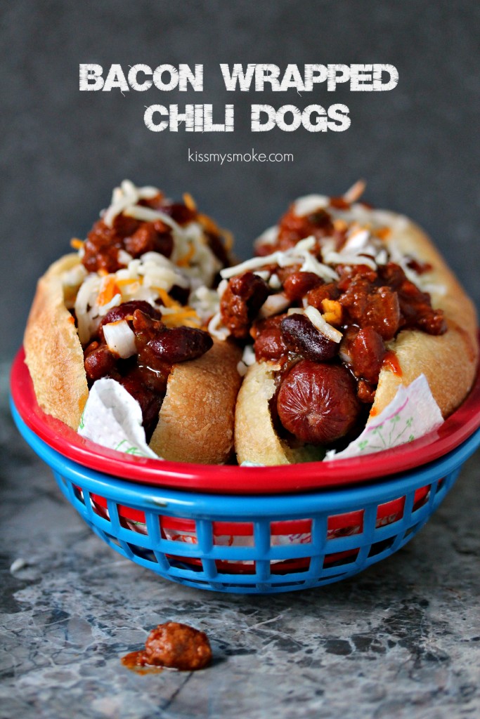 Bacon Wrapped Chili Dogs- This recipe wraps hot dogs in bacon, then tops them off with chili, onions and cheese. It's a bacon lovers dream come true. 