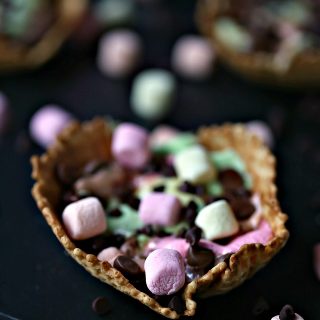 S'mores Campfire Waffle Cups are super quick and easy to make. Like campfire cones but cuter. Fill them up with all your favourites toppings!
