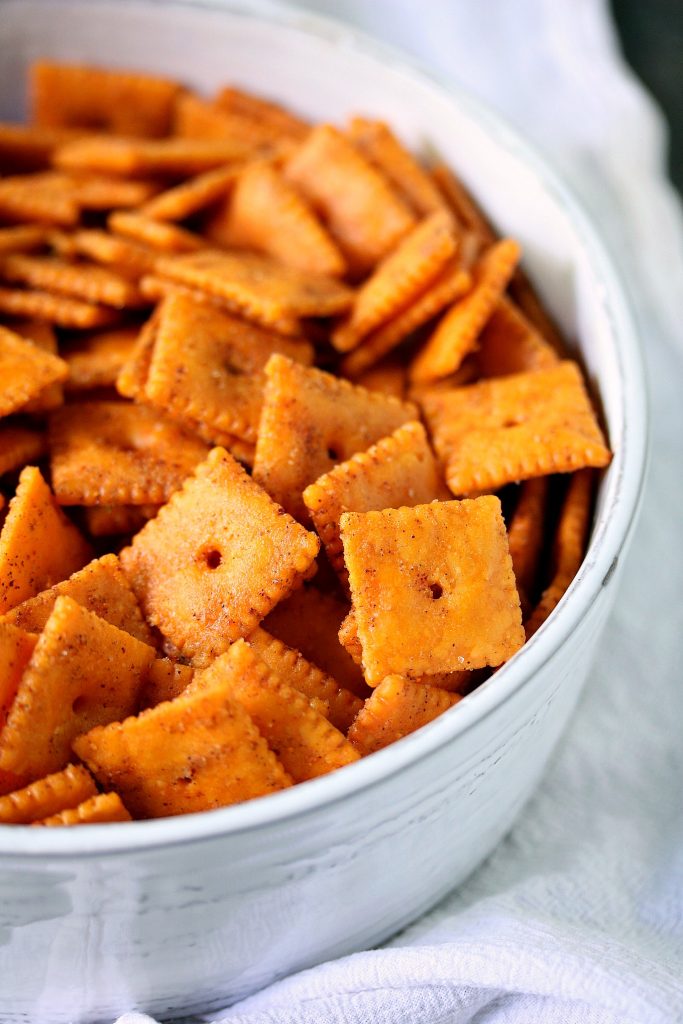 Smoked Cheez Its in a white and grey serving bowl.