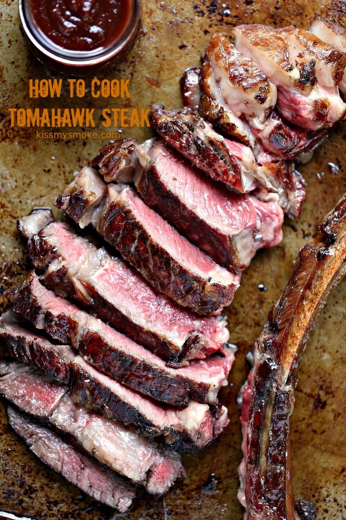 Overhead image of a grilled tomahawk steak that has been cooked and sliced. Bone has been cut off and is set next to the steak on the right side. A mason jar of bbq sauce is in the upper left corner. Text on image states recipe and blog name.